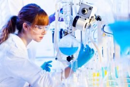 depositphotos_21607345-stock-photo-young-chemist-in-the-laboratory